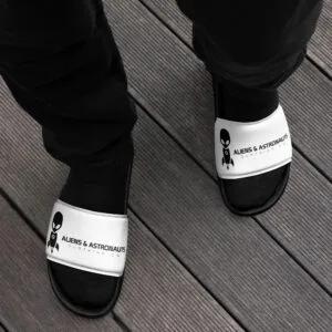 Shop – – Aliens & Astronauts Clothing Co. Alien Slides – Black men’s slides with alien face design, ultimate streetwear comfort, 2025 collection